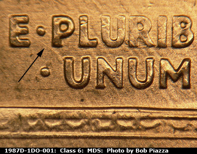 Die-stage B marker on 1987D•1DO•001 (1987 Doubled Die Obverse).