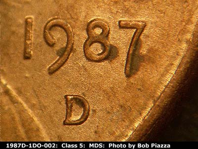 Die-stage B marker on 1987D•1DO•002 (1987 Doubled Die Obverse).