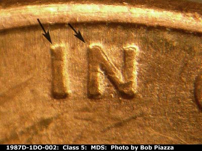Die-stage B marker on 1987D•1DO•002 (1987 Doubled Die Obverse).