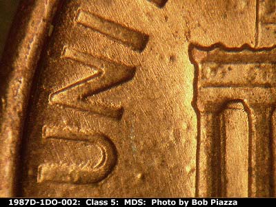 Die-stage B marker on 1987D•1DO•002 (1987 Doubled Die Obverse).