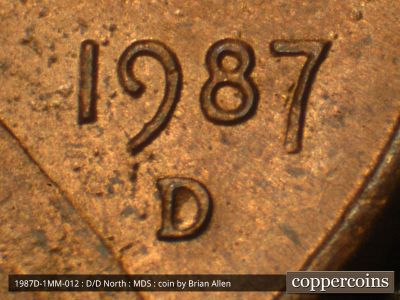 Die-stage B marker on 1987D•1MM•012 (1987 Repunched Mint Mark).