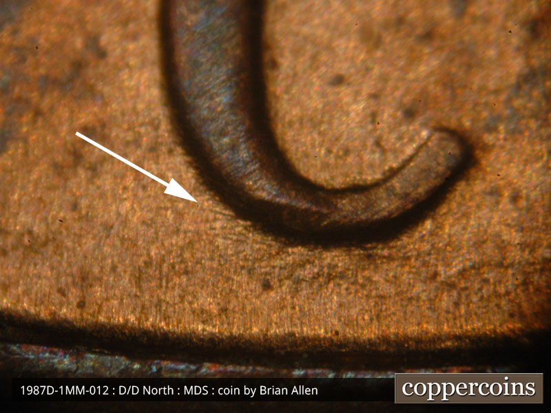 Die-stage B marker on 1987D•1MM•012 (1987 Repunched Mint Mark).