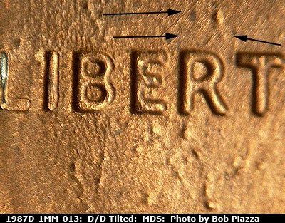 Die-stage B marker on 1987D•1MM•013 (1987 Repunched Mint Mark).