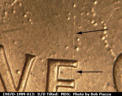 Die-stage B marker on 1987D•1MM•013 (1987 Repunched Mint Mark).