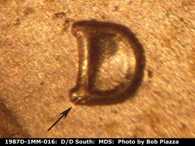 Die-stage B marker on 1987D•1MM•016 (1987 Repunched Mint Mark).