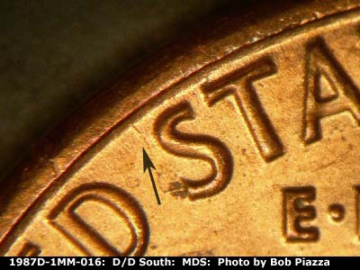 Die-stage B marker on 1987D•1MM•016 (1987 Repunched Mint Mark).