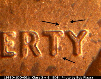 Die-stage A marker on 1988D•1DO•001 (1988 Doubled Die Obverse).