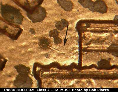 Die-stage B marker on 1988D•1DO•002 (1988 Doubled Die Obverse).
