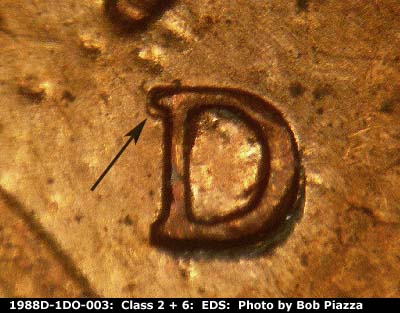 Die-stage A marker on 1988D•1DO•003 (1988 Doubled Die Obverse).