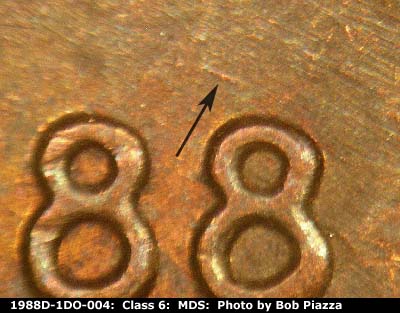 Die-stage B marker on 1988D•1DO•004 (1988 Doubled Die Obverse).