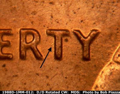 Die-stage B marker on 1988D•1MM•012 (1988 Repunched Mint Mark).