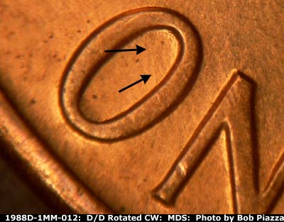 Die-stage B marker on 1988D•1MM•012 (1988 Repunched Mint Mark).