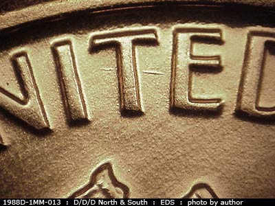 Die-stage A marker on 1988D•1MM•013 (1988 Repunched Mint Mark).