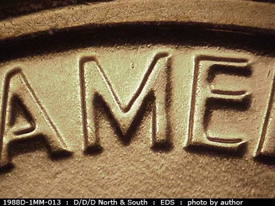 Die-stage A marker on 1988D•1MM•013 (1988 Repunched Mint Mark).