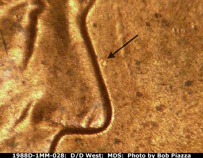 Die-stage B marker on 1988D•1MM•028 (1988 Repunched Mint Mark).