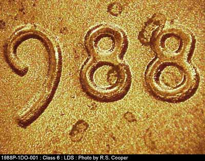 Die-stage C marker on 1988P•1DO•001 (1988 Doubled Die Obverse).