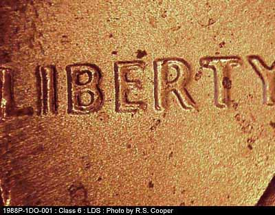 Die-stage C marker on 1988P•1DO•001 (1988 Doubled Die Obverse).
