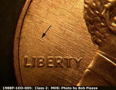 Die-stage B marker on 1988P•1DO•005 (1988 Doubled Die Obverse).