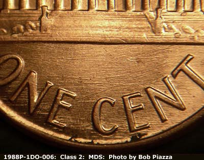 Die-stage B marker on 1988P•1DO•006 (1988 Doubled Die Obverse).