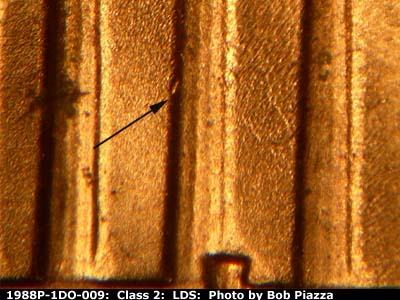 Die-stage C marker on 1988P•1DO•009 (1988 Doubled Die Obverse).