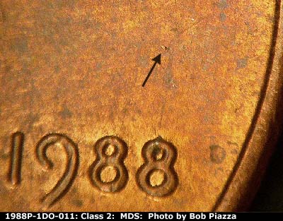 Die-stage B marker on 1988P•1DO•011 (1988 Doubled Die Obverse).
