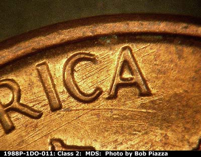 Die-stage B marker on 1988P•1DO•011 (1988 Doubled Die Obverse).