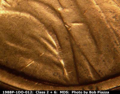 Die-stage B marker on 1988P•1DO•012 (1988 Doubled Die Obverse).