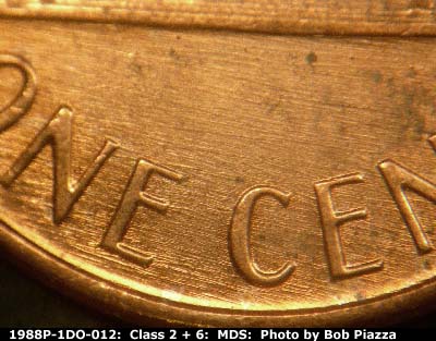 Die-stage B marker on 1988P•1DO•012 (1988 Doubled Die Obverse).
