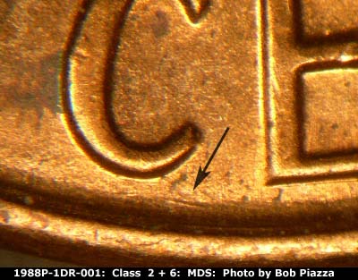 Die-stage B marker on 1988P•1DR•001 (1988 Doubled Die Reverse).