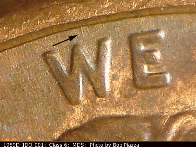 Die-stage B marker on 1989D•1DO•001 (1989 Doubled Die Obverse).