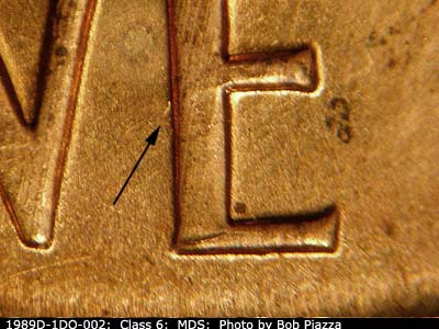 Die-stage B marker on 1989D•1DO•002 (1989 Doubled Die Obverse).