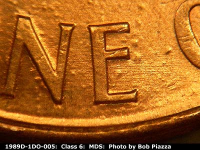 Die-stage B marker on 1989D•1DO•005 (1989 Doubled Die Obverse).