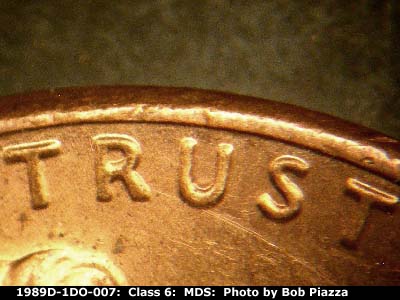 Die-stage B marker on 1989D•1DO•007 (1989 Doubled Die Obverse).