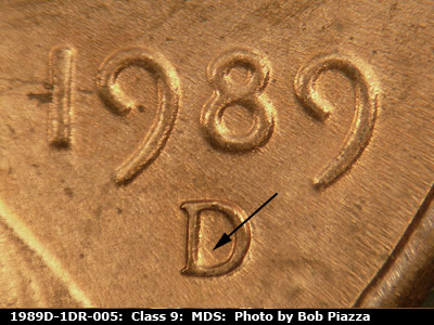 Die-stage B marker on 1989D•1DR•005 (1989 Doubled Die Reverse).