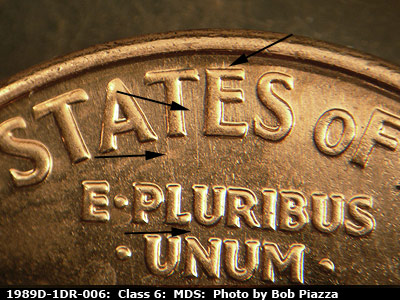 Die-stage B marker on 1989D•1DR•006 (1989 Doubled Die Reverse).