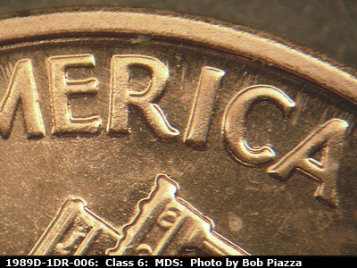 Die-stage B marker on 1989D•1DR•006 (1989 Doubled Die Reverse).