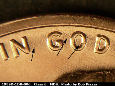 Die-stage B marker on 1989D•1DR•006 (1989 Doubled Die Reverse).