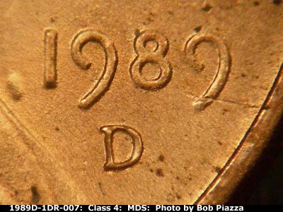 Die-stage B marker on 1989D•1DR•007 (1989 Doubled Die Reverse).
