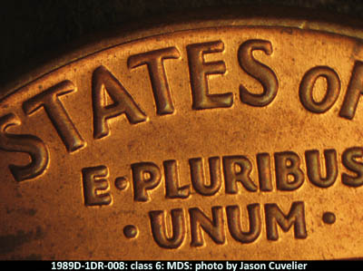 Die-stage B marker on 1989D•1DR•008 (1989 Doubled Die Reverse).