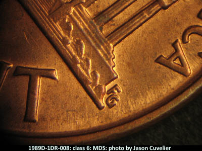 Die-stage B marker on 1989D•1DR•008 (1989 Doubled Die Reverse).