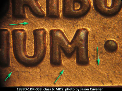 Die-stage B marker on 1989D•1DR•008 (1989 Doubled Die Reverse).