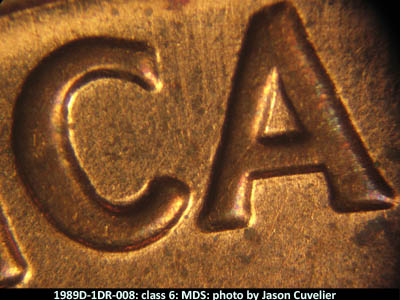 Die-stage B marker on 1989D•1DR•008 (1989 Doubled Die Reverse).