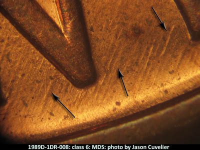Die-stage B marker on 1989D•1DR•008 (1989 Doubled Die Reverse).