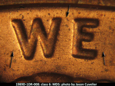 Die-stage B marker on 1989D•1DR•008 (1989 Doubled Die Reverse).