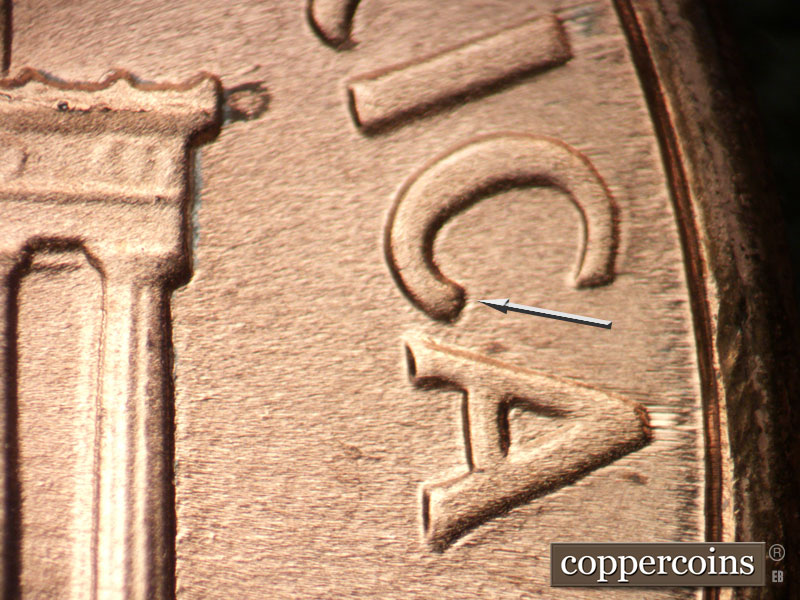 Die-stage B marker on 1989D•1DR•009 (1989 Doubled Die Reverse).