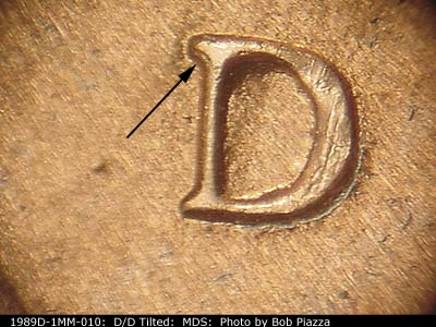 Die-stage B marker on 1989D•1MM•010 (1989 Repunched Mint Mark).
