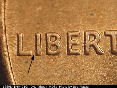 Die-stage B marker on 1989D•1MM•010 (1989 Repunched Mint Mark).