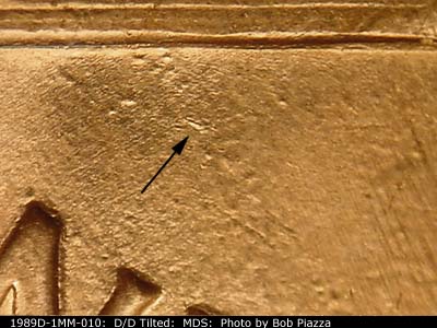 Die-stage B marker on 1989D•1MM•010 (1989 Repunched Mint Mark).