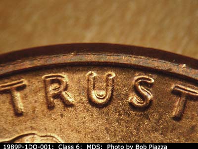 Die-stage B marker on 1989P•1DO•001 (1989 Doubled Die Obverse).