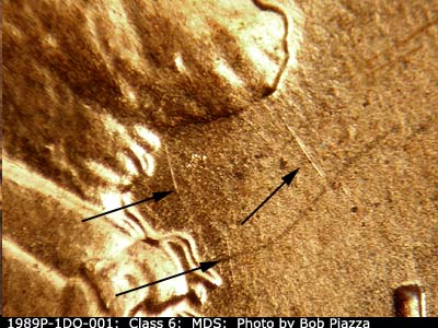 Die-stage B marker on 1989P•1DO•001 (1989 Doubled Die Obverse).